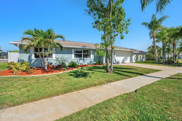1445 Centaurus Ct, Merritt Island, FL 32953 - ranch-style home with stucco siding, driveway, an attached garage, and a front yard