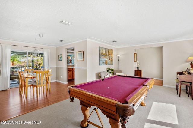 1445 Centaurus Ct, Merritt Island, FL 32953 - game room featuring ornamental molding, baseboards, billiards table, light wood-style floors, and a textured ceiling