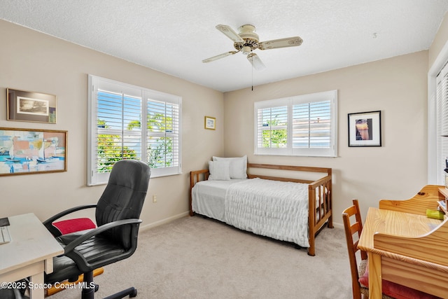 1445 Centaurus Ct, Merritt Island, FL 32953 - bedroom with a desk, baseboards, carpet, and ceiling fan