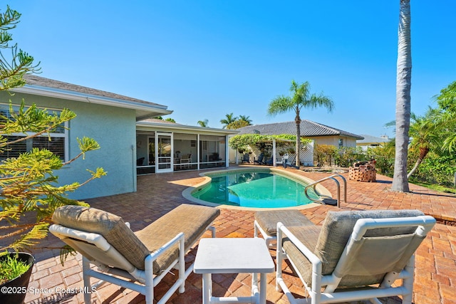 1445 Centaurus Ct, Merritt Island, FL 32953 - view of pool with a sunroom and a patio area