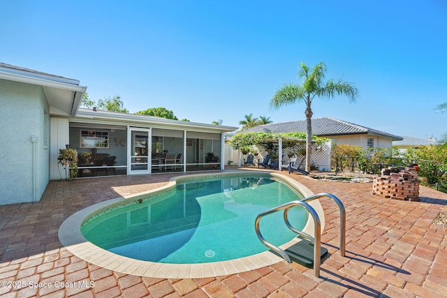 1445 Centaurus Ct, Merritt Island, FL 32953 - view of pool with a sunroom and a patio area