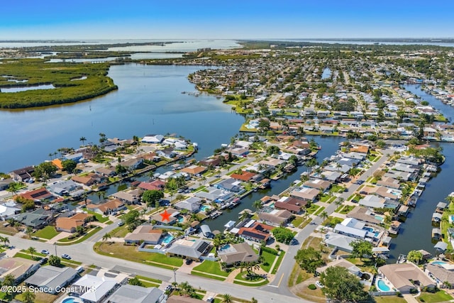 1445 Centaurus Ct, Merritt Island, FL 32953 - aerial overview of property's location featuring a large body of water and nearby suburban area