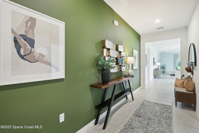 3175 Viridian Cir, Melbourne, FL 32904 - hall featuring light tile patterned flooring, baseboards, and visible vents