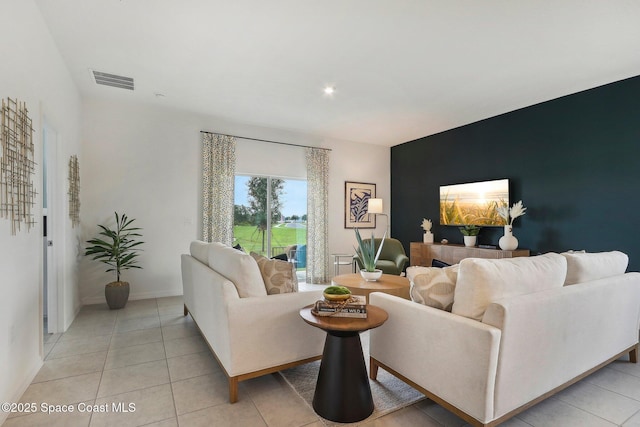 3175 Viridian Cir, Melbourne, FL 32904 - living area featuring baseboards, visible vents, recessed lighting, and light tile patterned floors