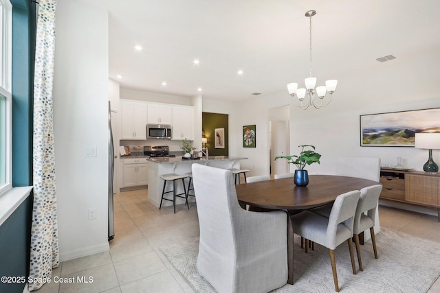 3175 Viridian Cir, Melbourne, FL 32904 - dining space with visible vents, recessed lighting, light tile patterned floors, and a chandelier