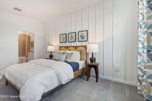 3175 Viridian Cir, Melbourne, FL 32904 - bedroom featuring connected bathroom, visible vents, and carpet