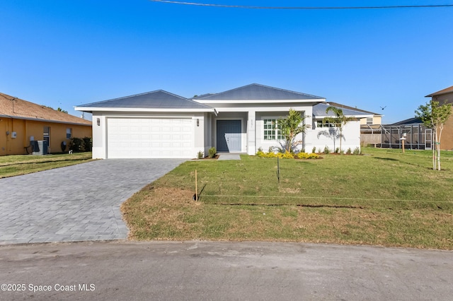 5271 NW Mayfield Ln, Port St Lucie, FL 34983 - view of front of property with cooling unit, stucco siding, an attached garage, decorative driveway, and a front lawn