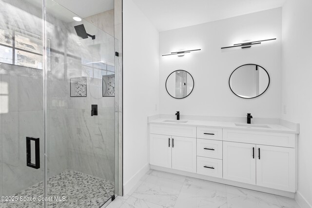 5271 NW Mayfield Ln, Port St Lucie, FL 34983 - bathroom featuring marble finish floor, a sink, and a shower stall