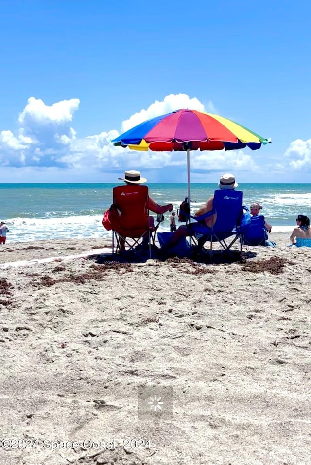 property view of water featuring a beach view