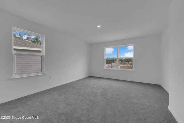 3155 Viridian Cir, Melbourne, FL 32904 - carpeted empty room featuring baseboards and recessed lighting