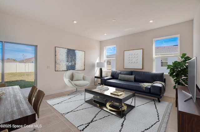 3155 Viridian Cir, Melbourne, FL 32904 - living area featuring light tile patterned flooring, recessed lighting, and a wealth of natural light