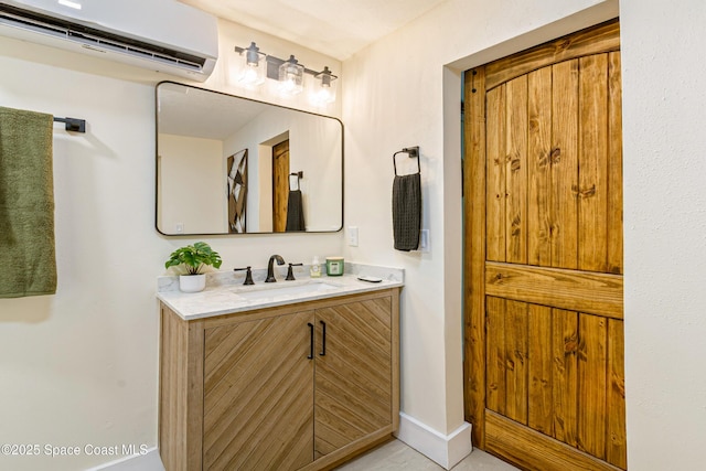 bathroom with vanity and an AC wall unit