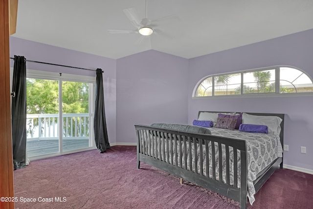 bedroom featuring carpet, access to exterior, and multiple windows