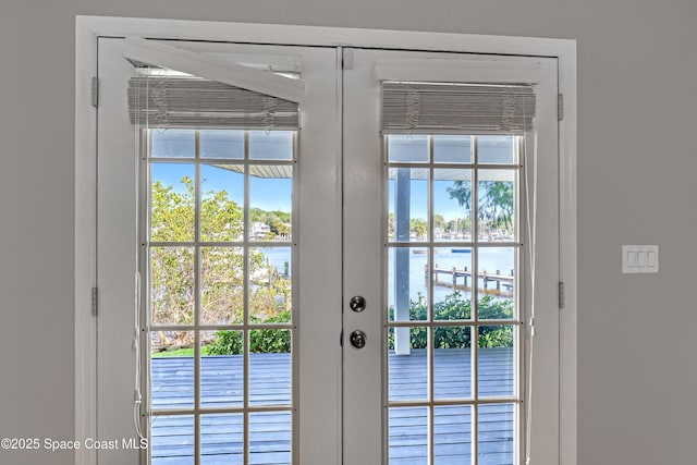 entryway featuring a water view