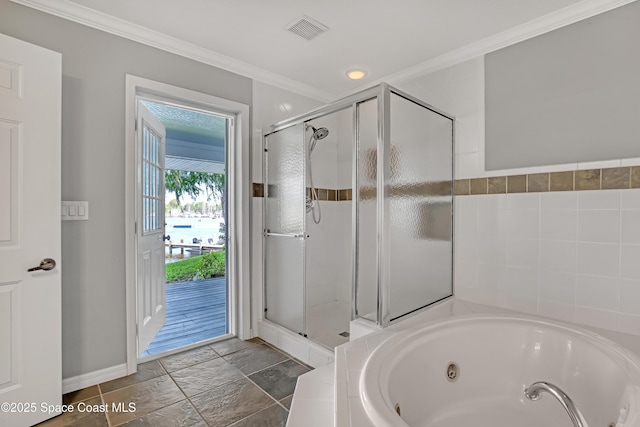 full bath with crown molding, a shower stall, a jetted tub, baseboards, and stone tile floors