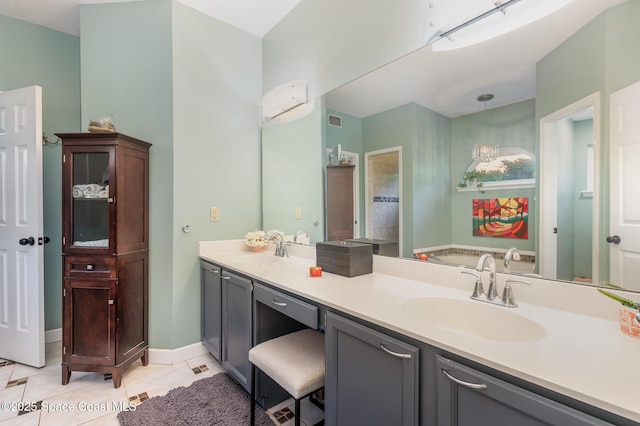 bathroom featuring a sink, tile patterned floors, double vanity, and visible vents