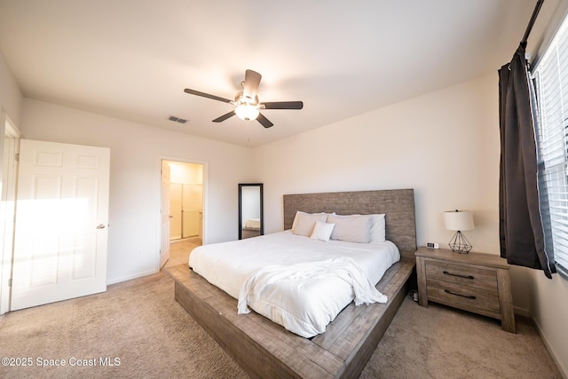 487 Old Country Rd SE, Palm Bay, FL 32909 - bedroom with carpet floors, baseboards, ceiling fan, and visible vents