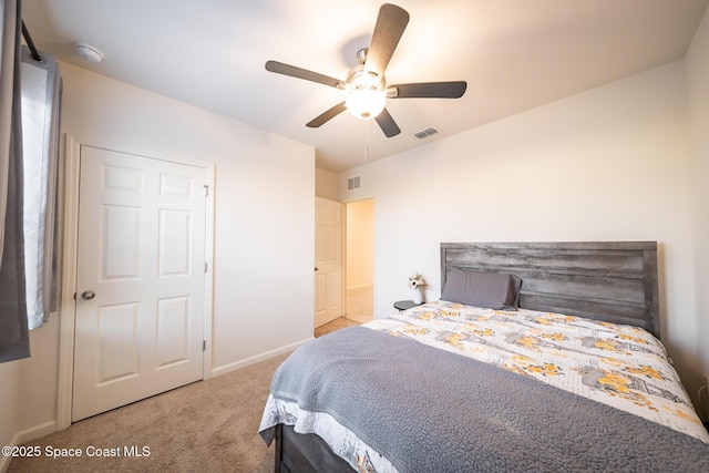 487 Old Country Rd SE, Palm Bay, FL 32909 - bedroom featuring baseboards, carpet flooring, visible vents, and a ceiling fan