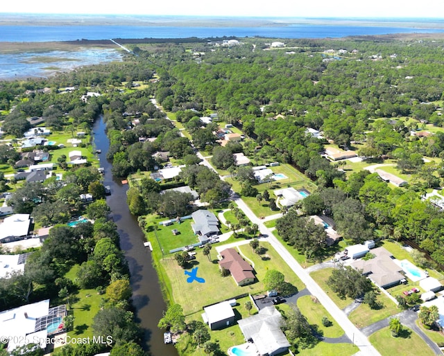 5215 Pina Vista Dr, Melbourne, FL 32934 - aerial view of property and surrounding area featuring a large body of water and nearby suburban area