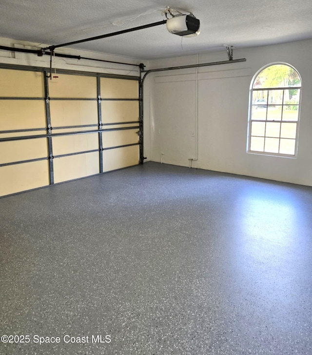 5215 Pina Vista Dr, Melbourne, FL 32934 - garage with a garage door opener