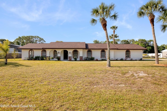 5215 Pina Vista Dr, Melbourne, FL 32934 - single story home with a front yard and stucco siding