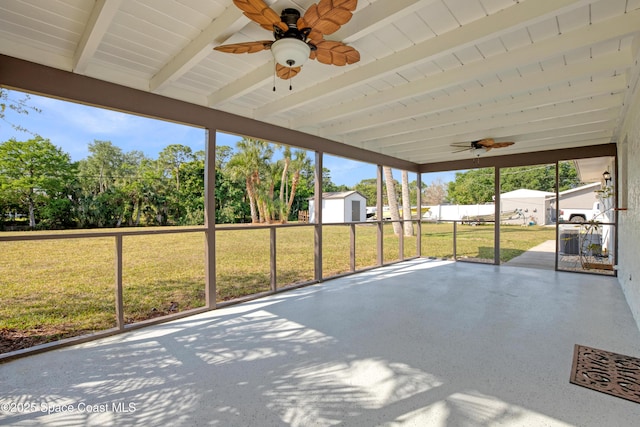 5215 Pina Vista Dr, Melbourne, FL 32934 - unfurnished sunroom with ceiling fan and beamed ceiling