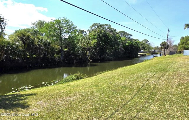 5215 Pina Vista Dr, Melbourne, FL 32934 - view of green lawn with a water view