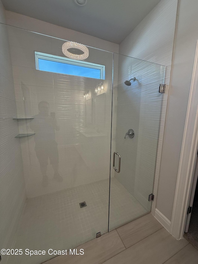 full bathroom featuring a stall shower