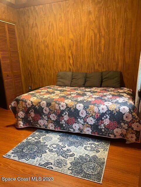 bedroom featuring wood finished floors