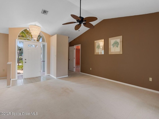 344 Concha Dr, Sebastian, FL 32958 - unfurnished living room featuring visible vents, baseboards, ceiling fan with notable chandelier, light colored carpet, and lofted ceiling