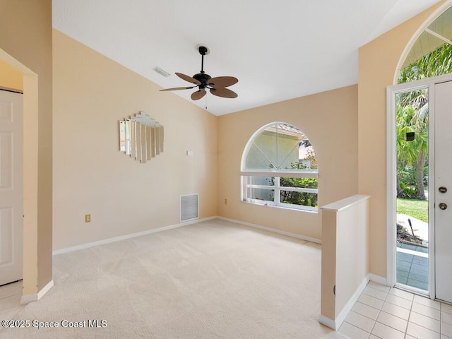 344 Concha Dr, Sebastian, FL 32958 - foyer entrance featuring visible vents, baseboards, a ceiling fan, and vaulted ceiling