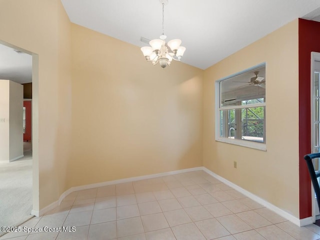 344 Concha Dr, Sebastian, FL 32958 - empty room featuring baseboards and ceiling fan with notable chandelier