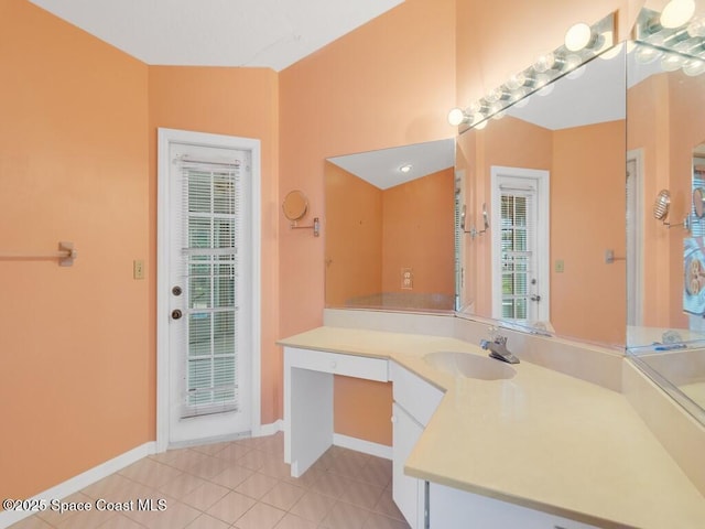 344 Concha Dr, Sebastian, FL 32958 - bathroom featuring tile patterned floors, vanity, and baseboards