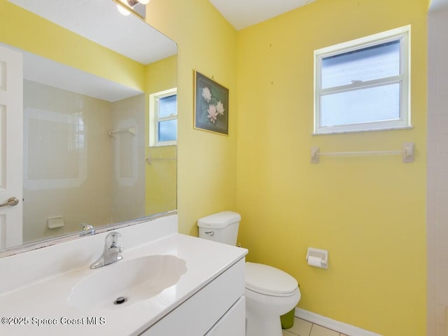 344 Concha Dr, Sebastian, FL 32958 - bathroom with tile patterned floors, toilet, vanity, and baseboards