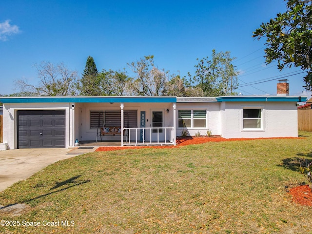 1760 Tee Dee Ln, Titusville, FL 32780 - ranch-style home featuring driveway, a chimney, stucco siding, an attached garage, and a front lawn