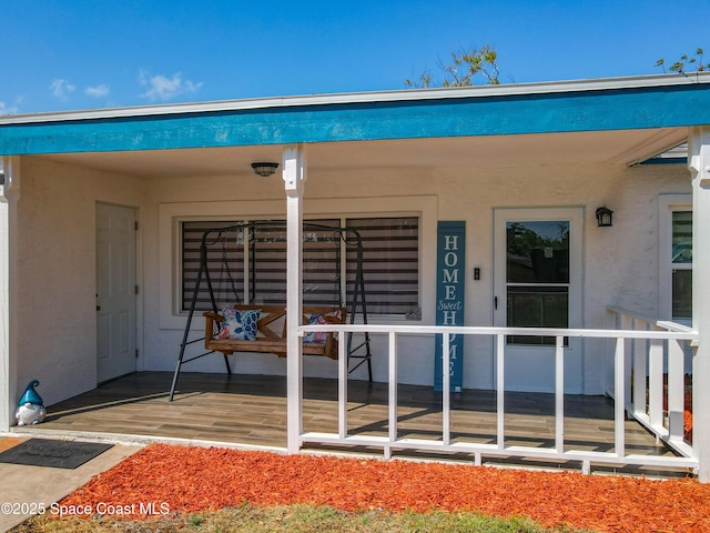 1760 Tee Dee Ln, Titusville, FL 32780 - property entrance featuring stucco siding