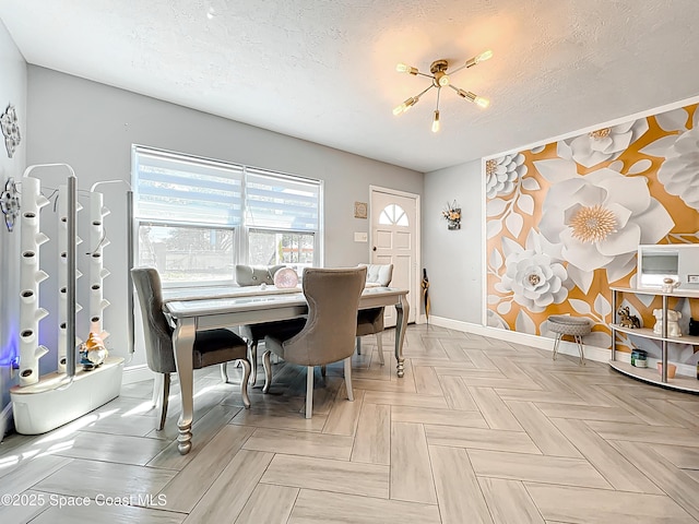 1760 Tee Dee Ln, Titusville, FL 32780 - dining room featuring baseboards and a textured ceiling