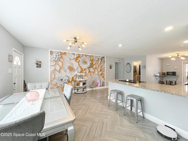 1760 Tee Dee Ln, Titusville, FL 32780 - dining area featuring baseboards, a textured ceiling, a healthy amount of sunlight, and recessed lighting