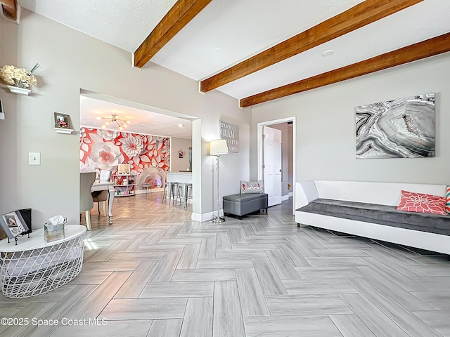 1760 Tee Dee Ln, Titusville, FL 32780 - living area featuring a notable chandelier, baseboards, and beamed ceiling