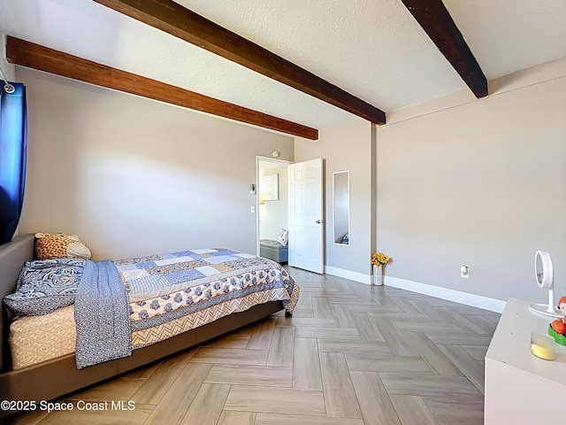 1760 Tee Dee Ln, Titusville, FL 32780 - bedroom with baseboards, beam ceiling, and a textured ceiling