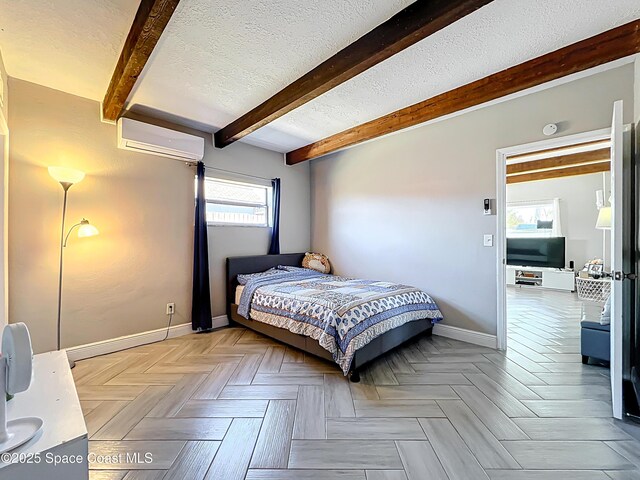 1760 Tee Dee Ln, Titusville, FL 32780 - bedroom featuring baseboards, a wall mounted AC, a textured ceiling, and beamed ceiling