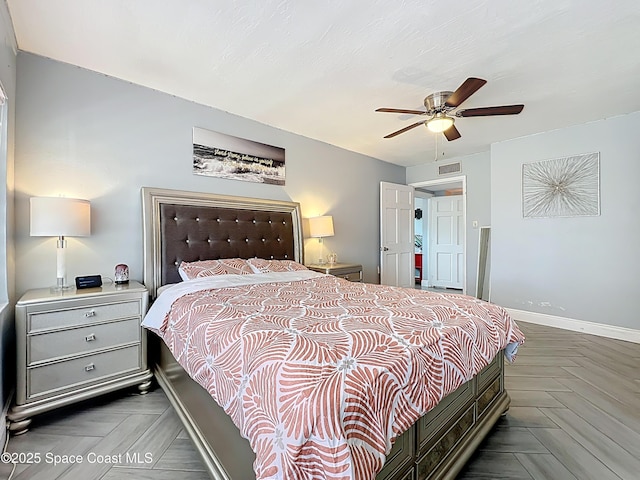 1760 Tee Dee Ln, Titusville, FL 32780 - bedroom featuring baseboards, ceiling fan, and visible vents
