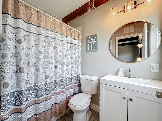 1760 Tee Dee Ln, Titusville, FL 32780 - bathroom with tile patterned flooring, vanity, toilet, baseboards, and visible vents
