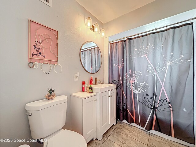 1760 Tee Dee Ln, Titusville, FL 32780 - bathroom featuring toilet, vanity, and a shower with curtain