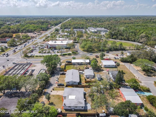 1760 Tee Dee Ln, Titusville, FL 32780 - birds eye view of property with a wooded view