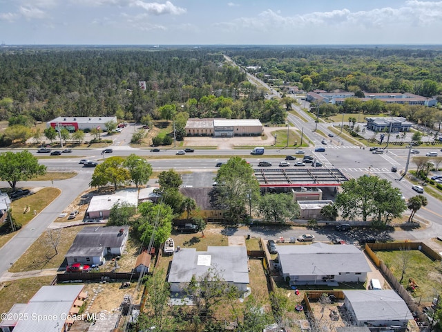 1760 Tee Dee Ln, Titusville, FL 32780 - drone / aerial view with a wooded view