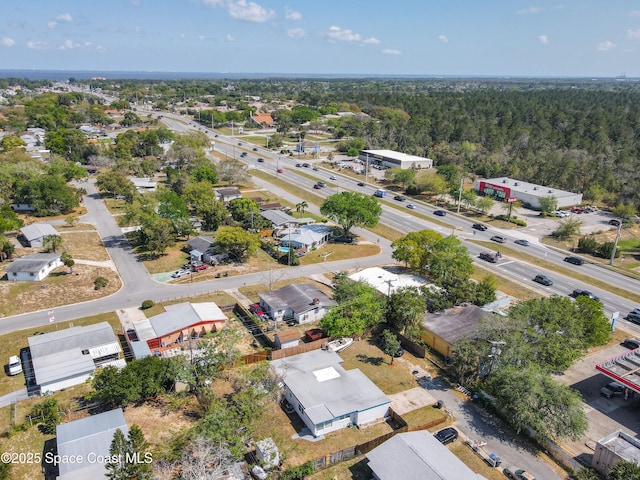 1760 Tee Dee Ln, Titusville, FL 32780 - drone / aerial view featuring a view of trees