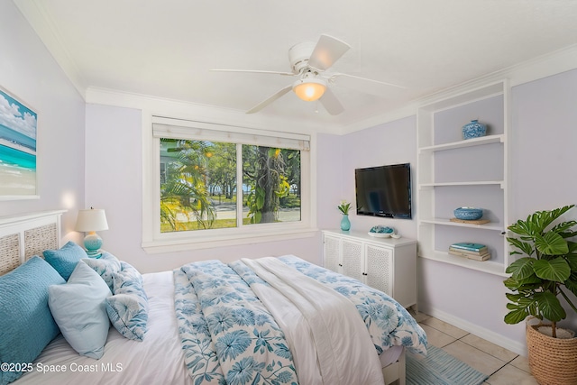 tiled bedroom with a ceiling fan and crown molding