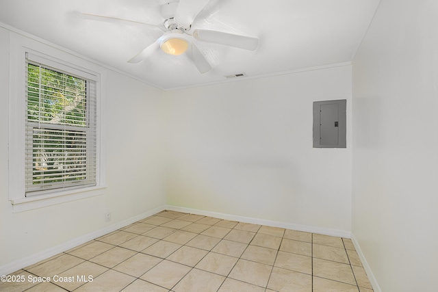 unfurnished room with electric panel, a ceiling fan, light tile patterned floors, baseboards, and visible vents