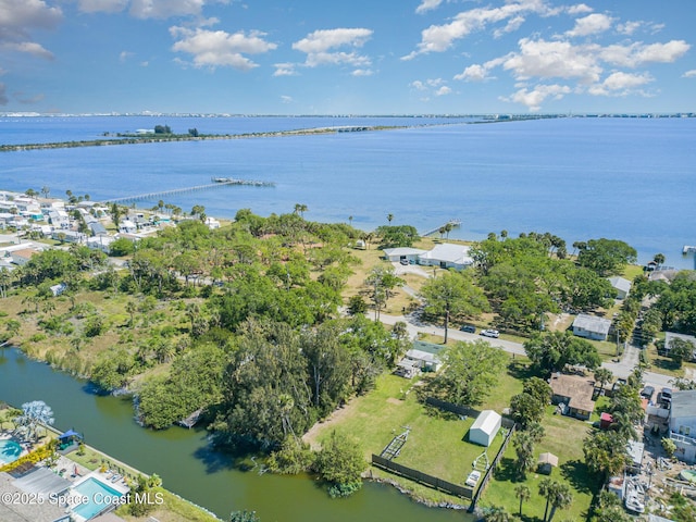 drone / aerial view with a water view